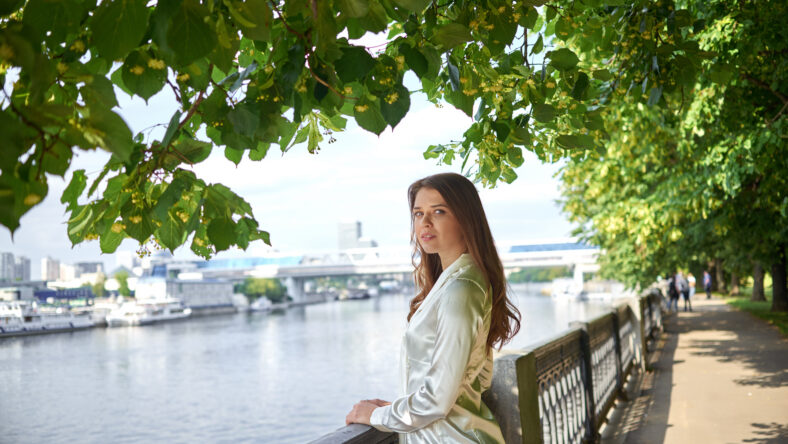 A young woman in a white shirt