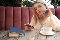 Cafe city lifestyle woman on phone drinking