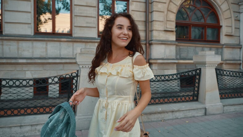Portrait of stylish smiling, happy brunette woman