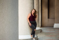 Young stylish woman walking on the city
