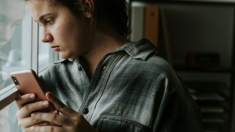 Teen girl on her phone