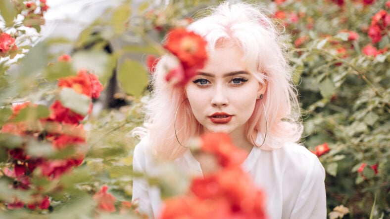 Summer beauty. Spring woman with flowers. Fashion