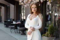 Young smiling woman outdoors portrait. Soft sunny