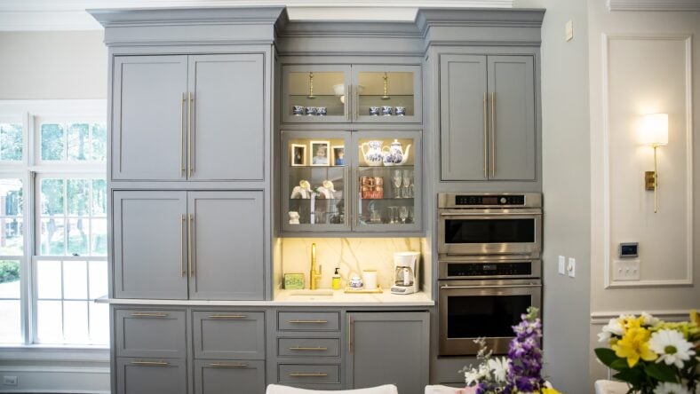Gray Grey modern Kitchen cabinets in a large expensive kitchen