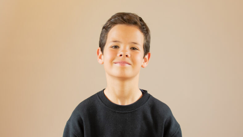 Portrait of a handsome smiling young boy