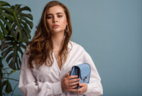 Fashionable woman wearing trendy white shirt, accessories,