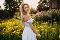Young slim woman with long blonde hair