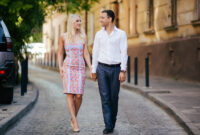walking down the street together. Happy young