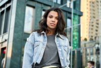 Confident beautiful curly young hipster African American