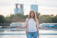 One woman standing outside stock photo