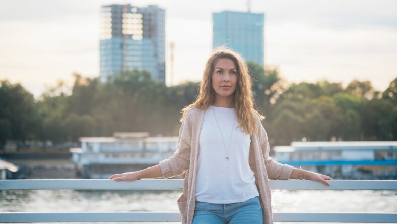 One woman standing outside stock photo