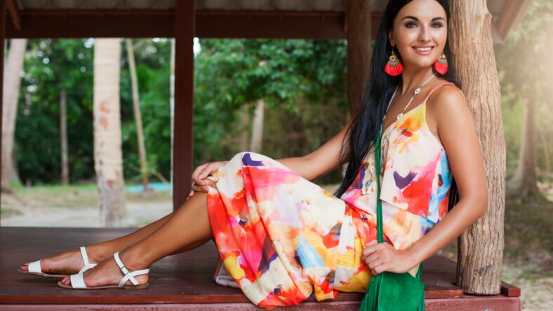 young beautiful woman in colorful dress, summer