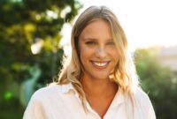 Beautiful happy woman smiling and looking at