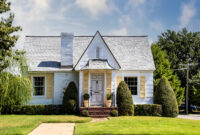 Cute yellow and white brick and siding