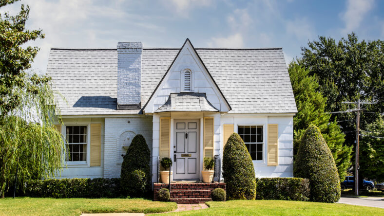 Cute yellow and white brick and siding