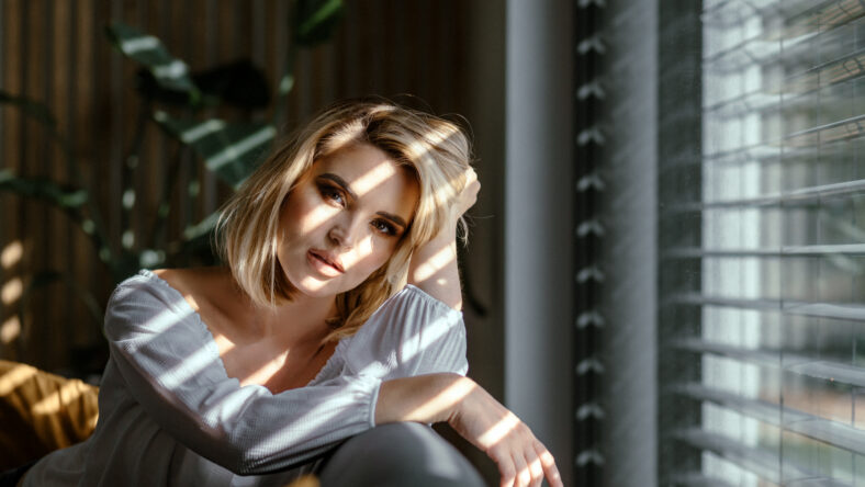 Glamour portrait beautiful lady at home looking