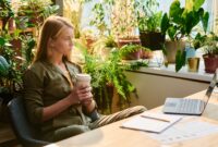 Young blond woman with cup of coffee