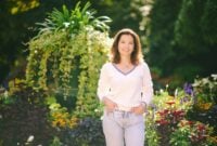 Outdoor portrait of happy beautiful 40 -