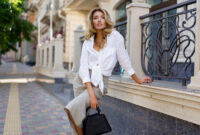 Outdoor portrait of beautiful blond woman perfect