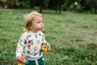 Toddler child little cute walking and playing