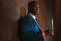 Retro african american businessman in blue suit