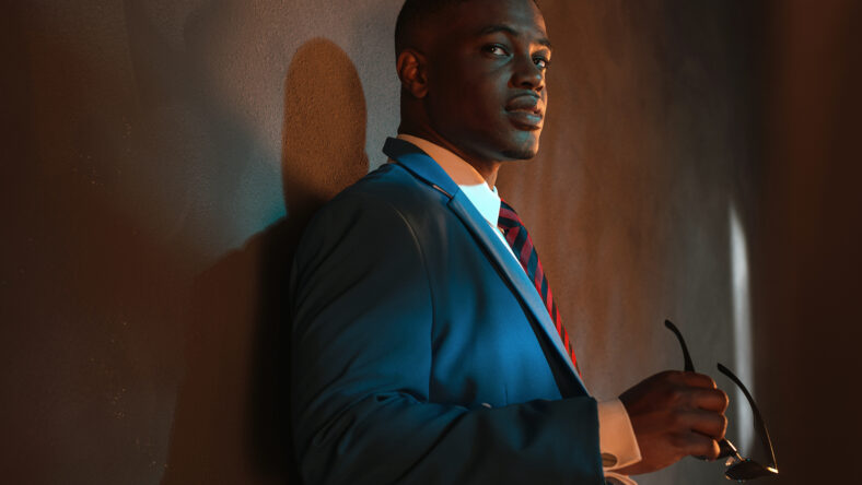 Retro african american businessman in blue suit