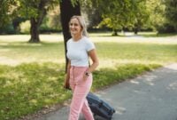 A young woman walking in a park