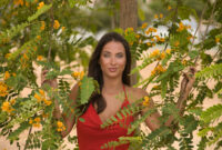 A beautiful young woman, with green eyes,